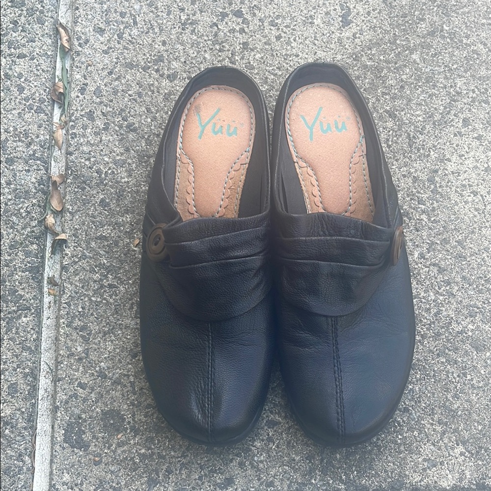 Yuu Black Leather Mules with‎ Button Detail